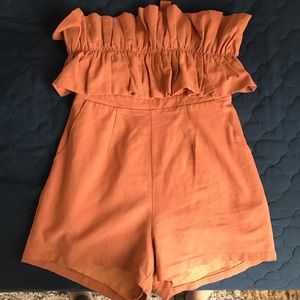 Orange lizard Thicket romper